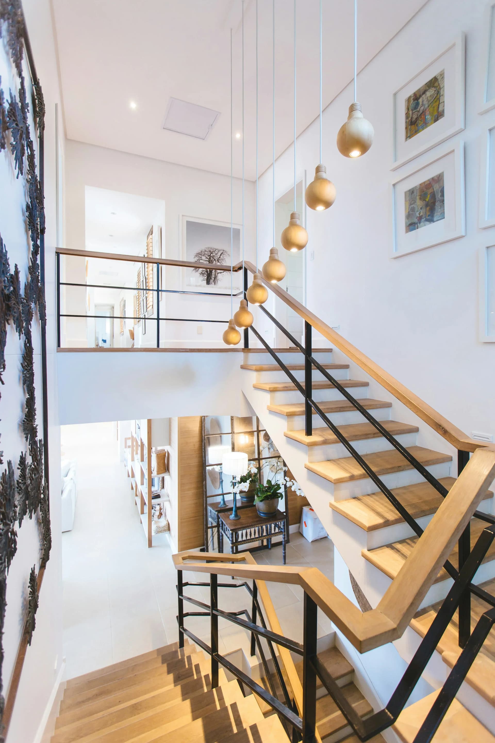 Modern staircase with pendant lights