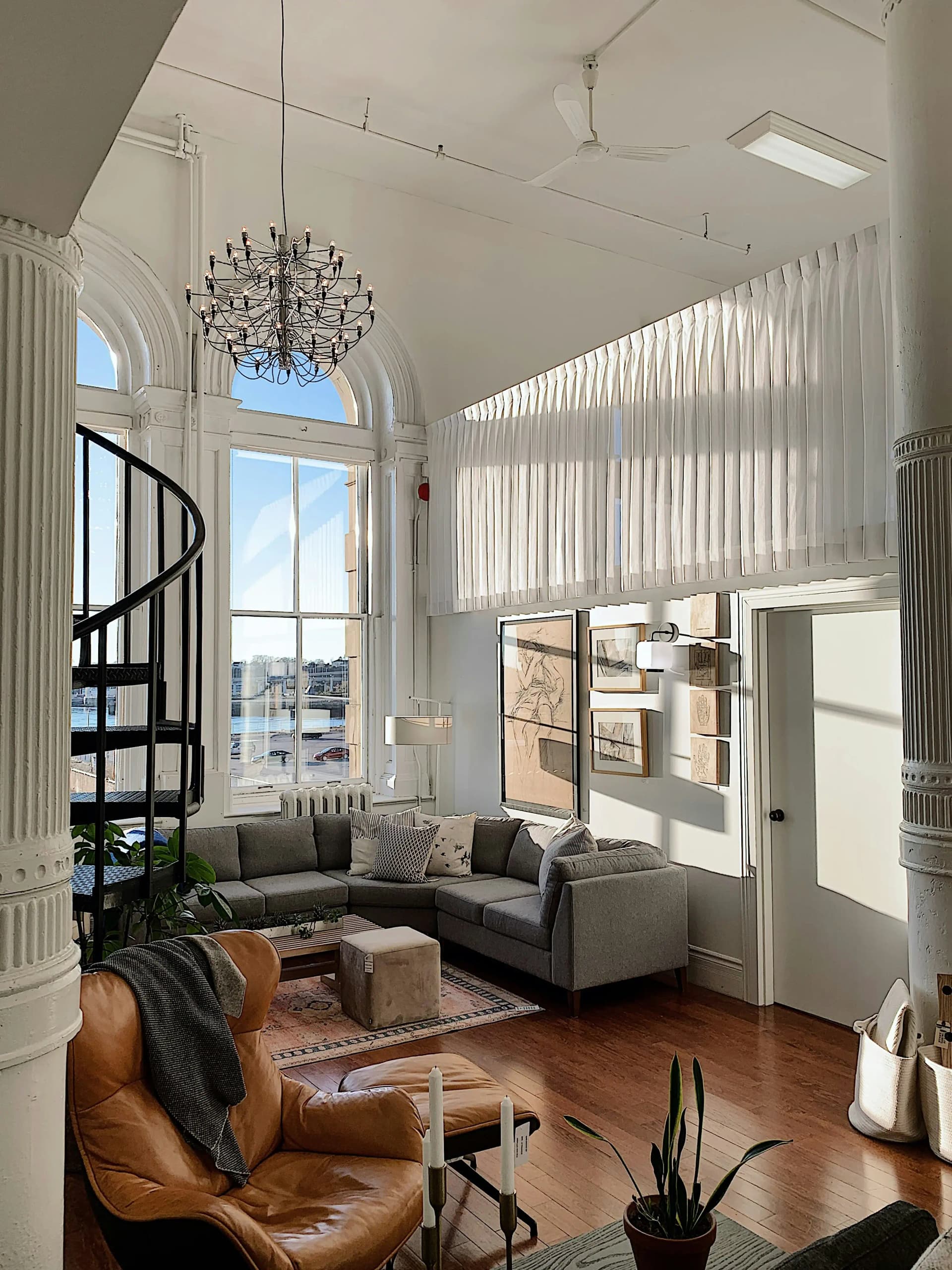 Elegant living space with spiral staircase